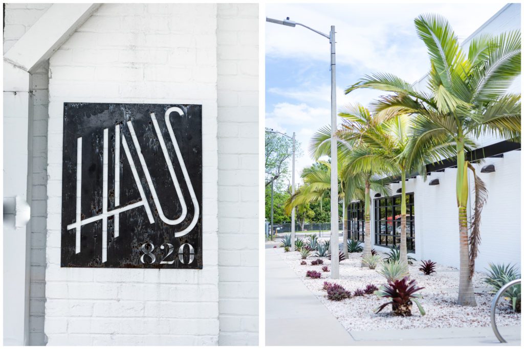 Haus 820 Logo and palm trees along the building side