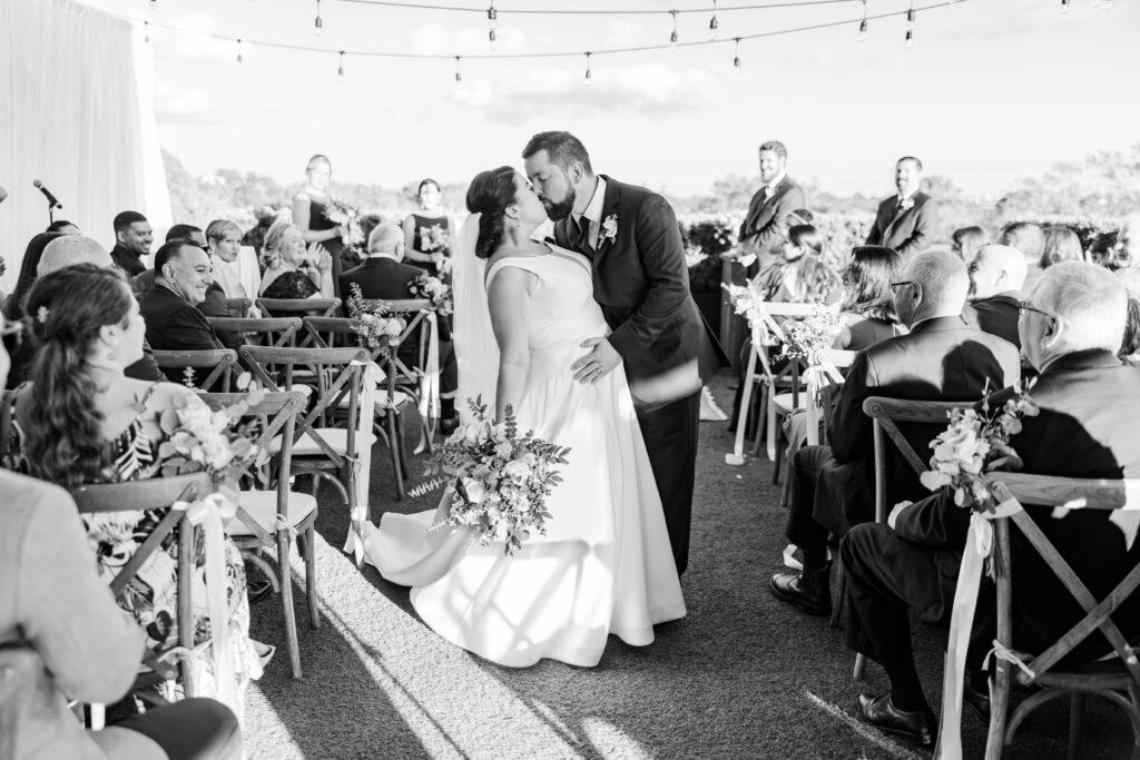 Epicurean Hotel Tampa Florida wedding photography ceremony bride and groom kiss