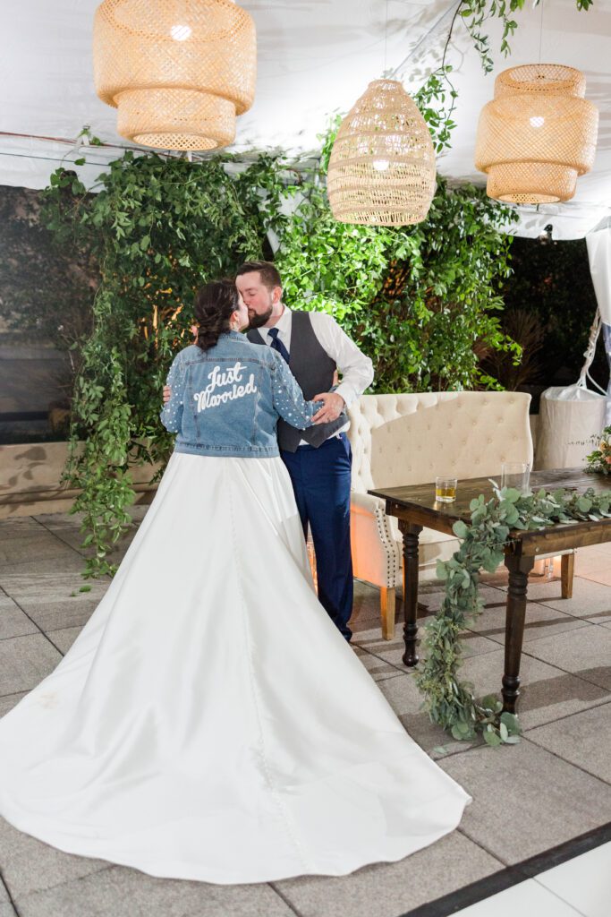 Epicurean Hotel Tampa Florida wedding photography reception tent jean jacket